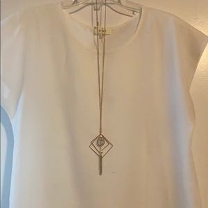 Shirt with a necklace